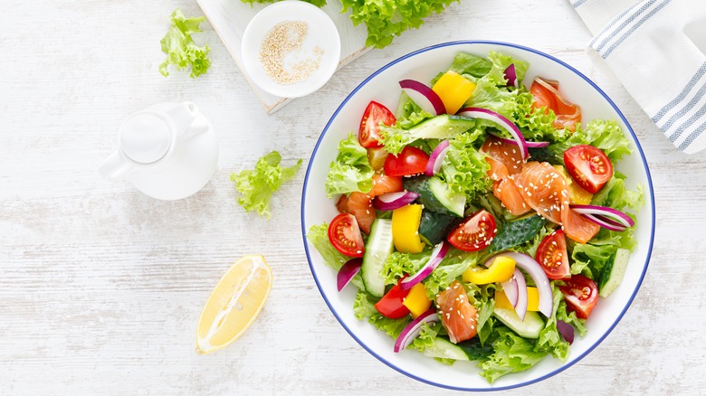 Salad on white table