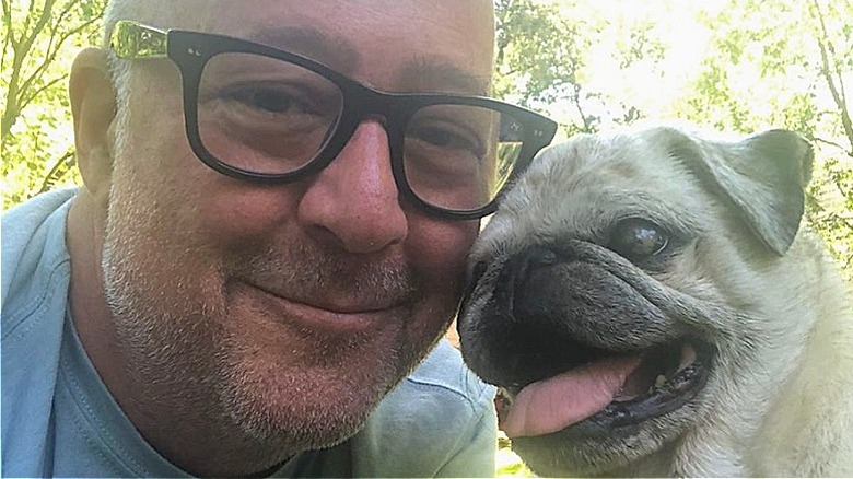 Andrew Zimmern and his dog, Pretzel