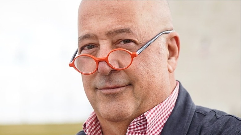 Andrew Zimmern smiling