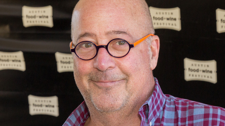 Andrew Zimmern smiling