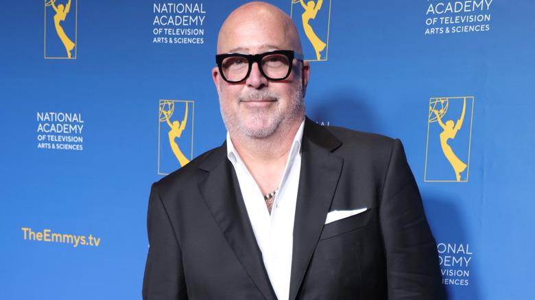 Andrew Zimmern smiling