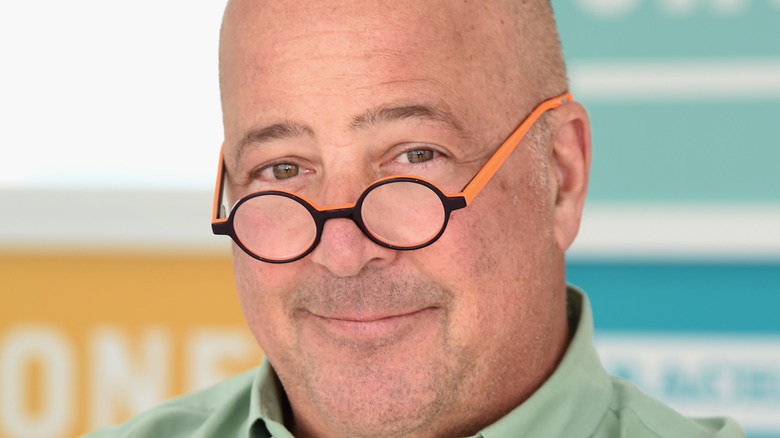 Andrew Zimmern smiling