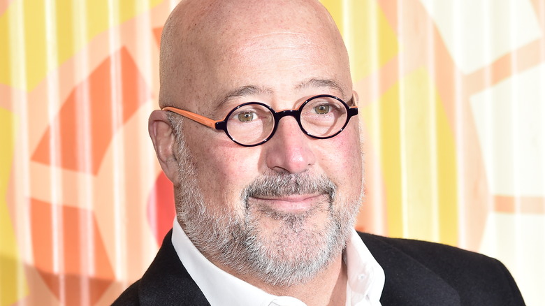 Andrew Zimmern smiling