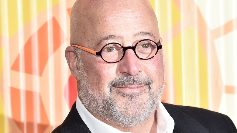 Andrew Zimmern smiling