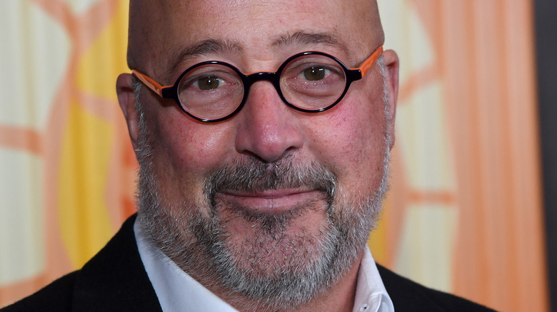 Andrew Zimmern smiling