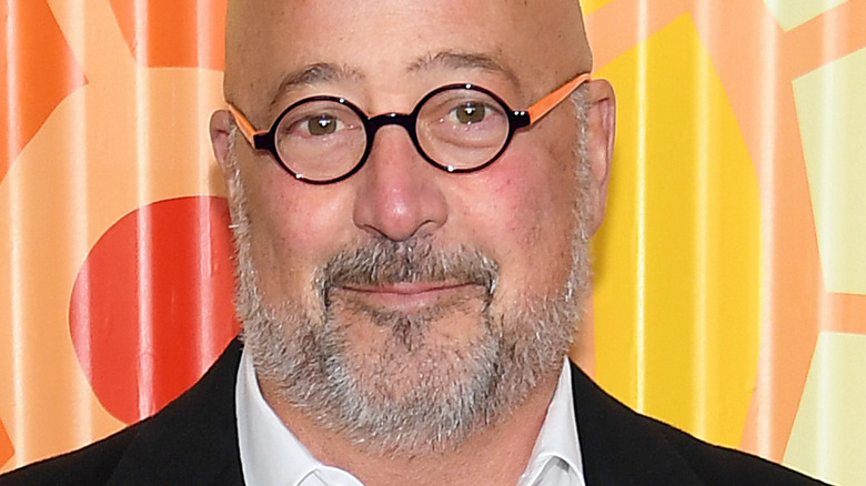 Andrew Zimmern smirking