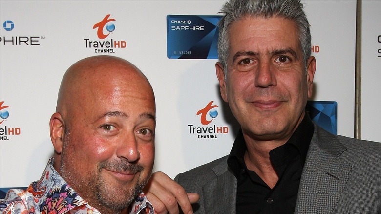 Andrew Zimmern and Anthony Bourdain smiling