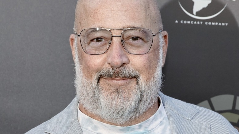 Andrew Zimmern wearing glasses