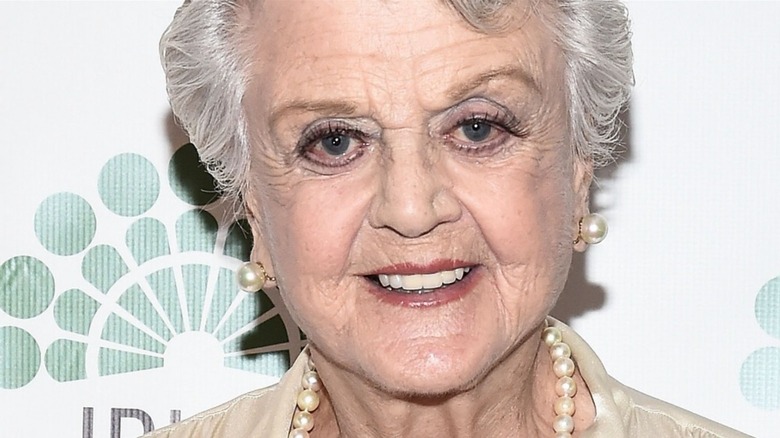 Angela Lansbury wearing pearl earrings