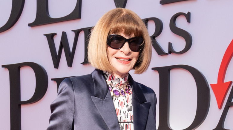 Anna Wintour smiling on red carpet for 