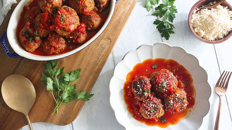 meatballs plated with sauce