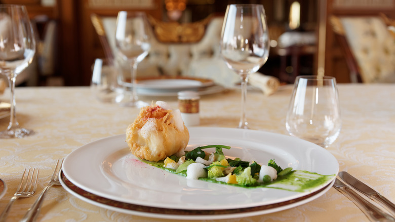 creative fish entree at expensive french restaurant