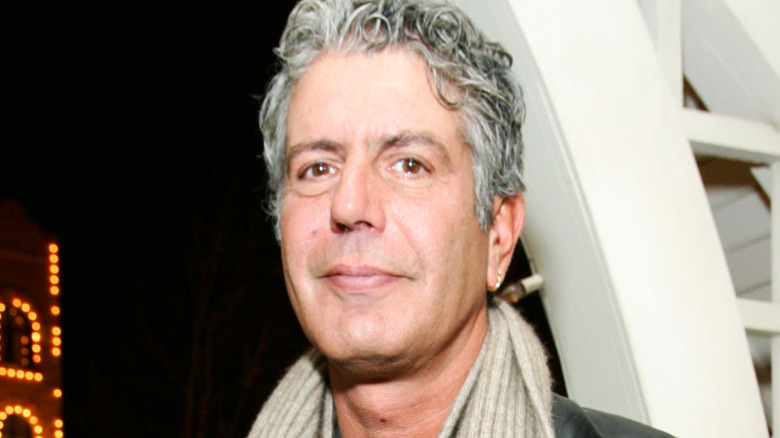 Close up of Anthony Bourdain wearing a scarf