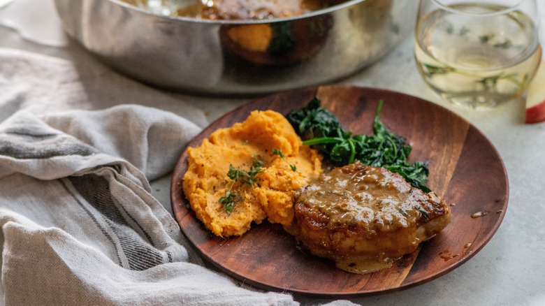 apple cider pork chop on plate