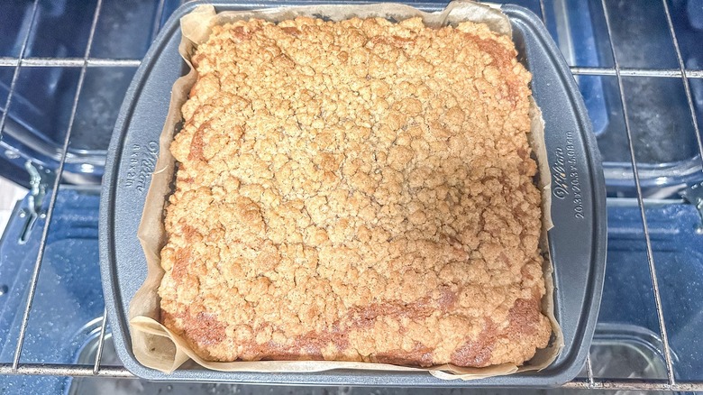 Crumb-topped coffee cake on oven rack