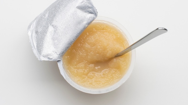 Applesauce with spoon