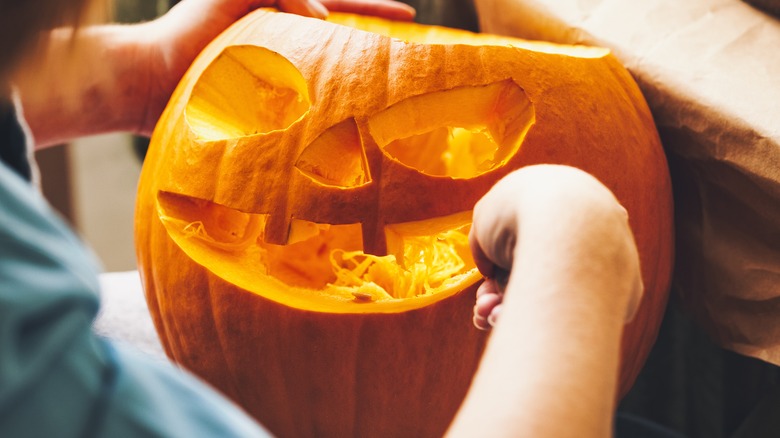 Carving a pumpkin