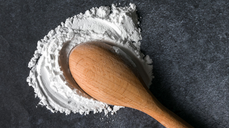 cream of tartar spilled out of wooden spoon