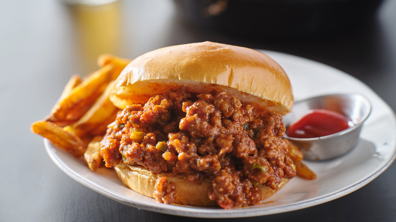 Sloppy Joe sandwich next to fries