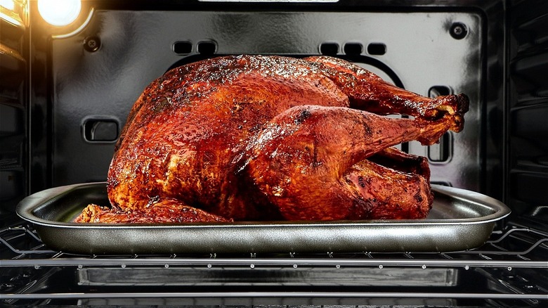 Turkey roasting in oven