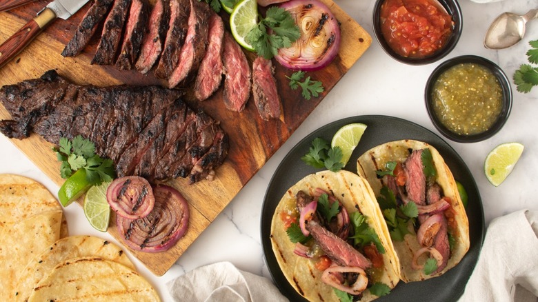 spread of skirt steak tacos