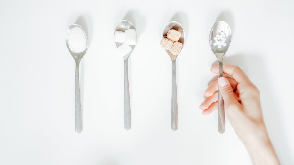Sweeteners on spoons