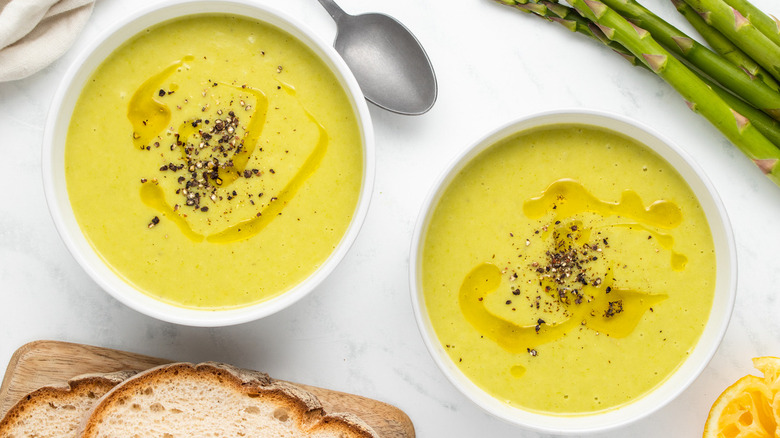 two bowls of asparagus soup