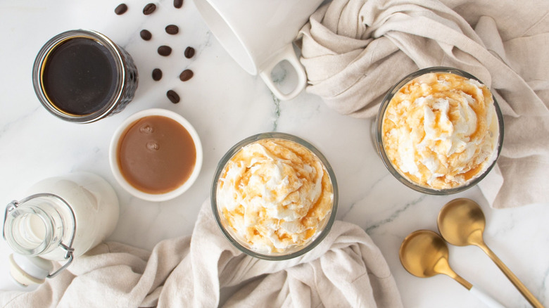 Top-down view of caramel frappes on countertop