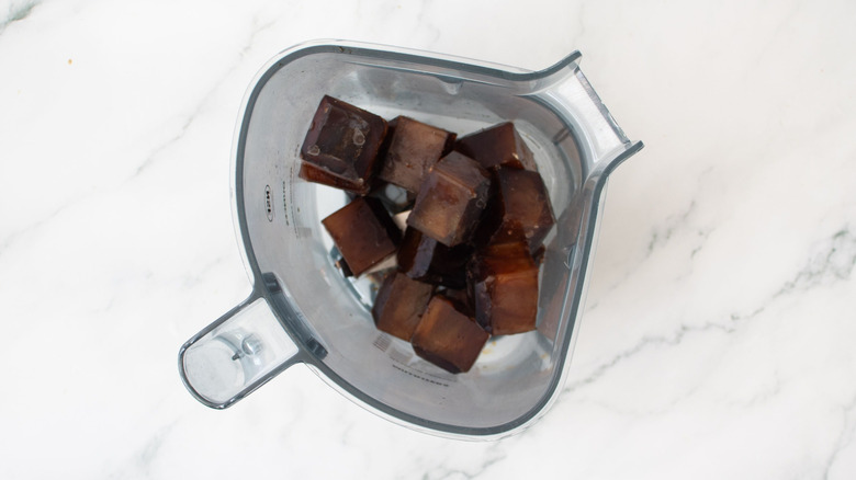 Coffee ice cubes in blender