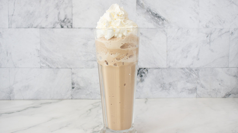 Frappe in glass with whipped cream