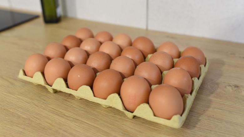 two dozen brown eggs
