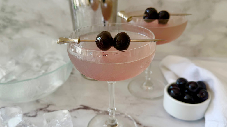 Aviation cocktails garnished with cherry skewers