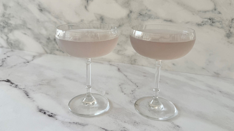 Pale purple cocktails in coupe glasses