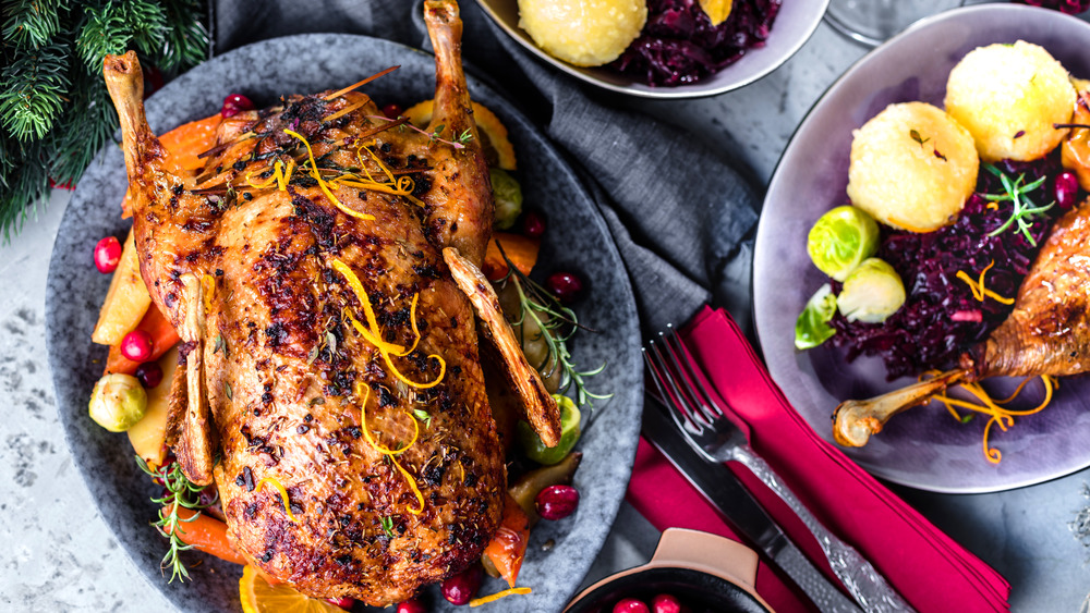 Roasted duck on a festive holiday table