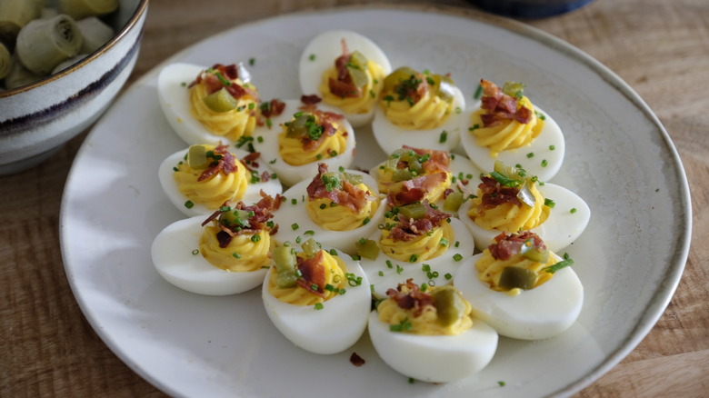 Deviled eggs sitting on a plate