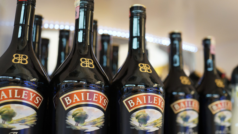 Rows of  Baileys bottles