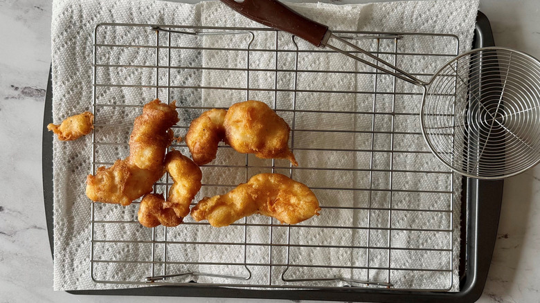 Fried fish on wire rack