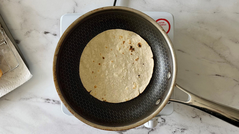 Corn tortilla in pan