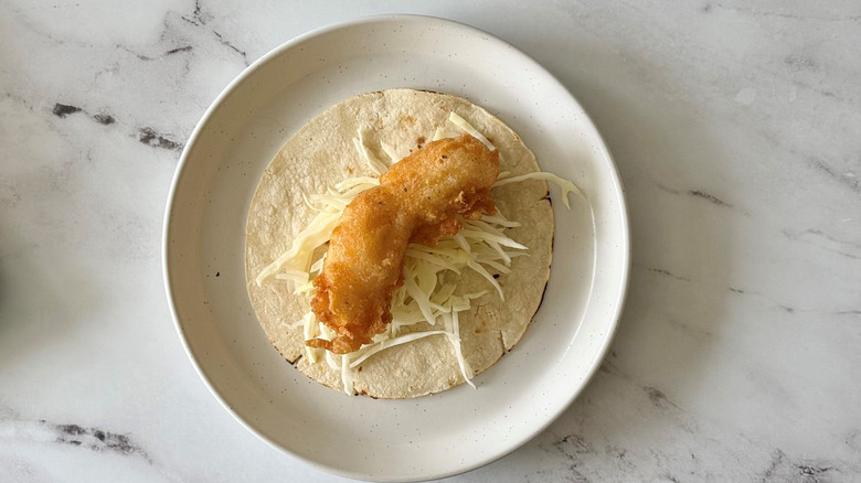 Fried fish taco on plate