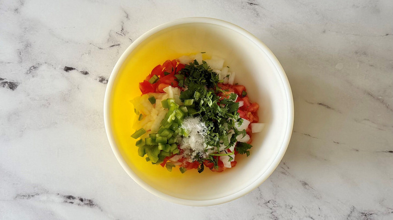 Unmixed pico de gallo in bowl