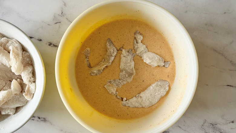 Cod pieces in batter in bowl