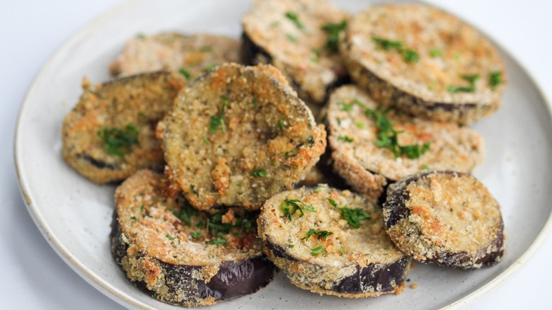 Baked breaded eggplant on a plate