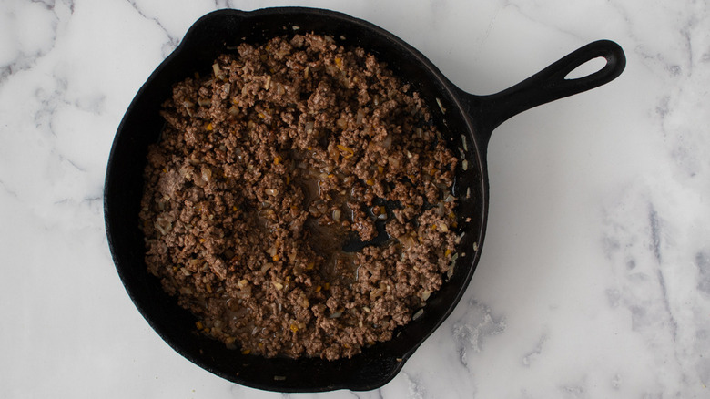 ground beef in black pan