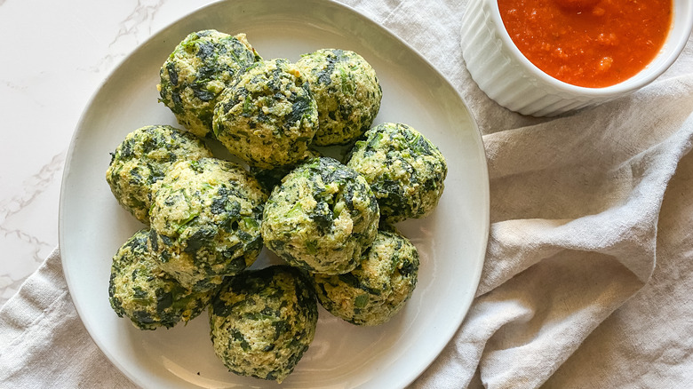 Parmesan spinach balls with marinara sauce