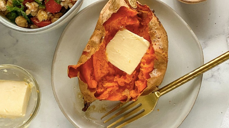 baked sweet potato on side of meal