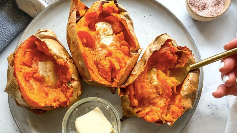 baked sweet potatoes with butter