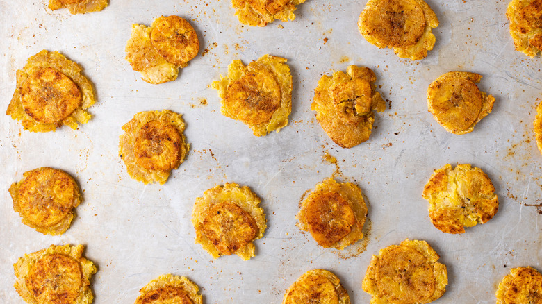 baked tostones on baking sheet