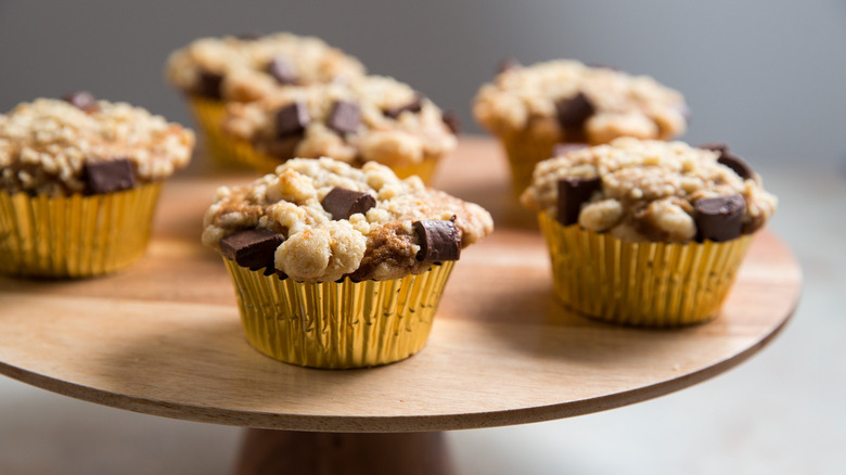 banana chocolate chip muffins on stand