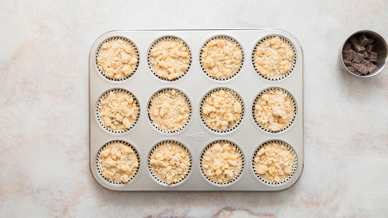 unbaked muffins in muffin tin
