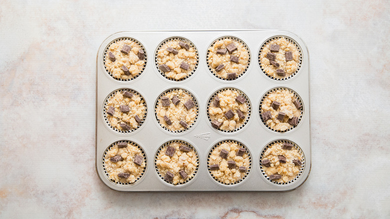 unbaked muffins in muffin tin